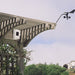 solar-powered wireless sensor transmitter mounted outdoors with anemometer